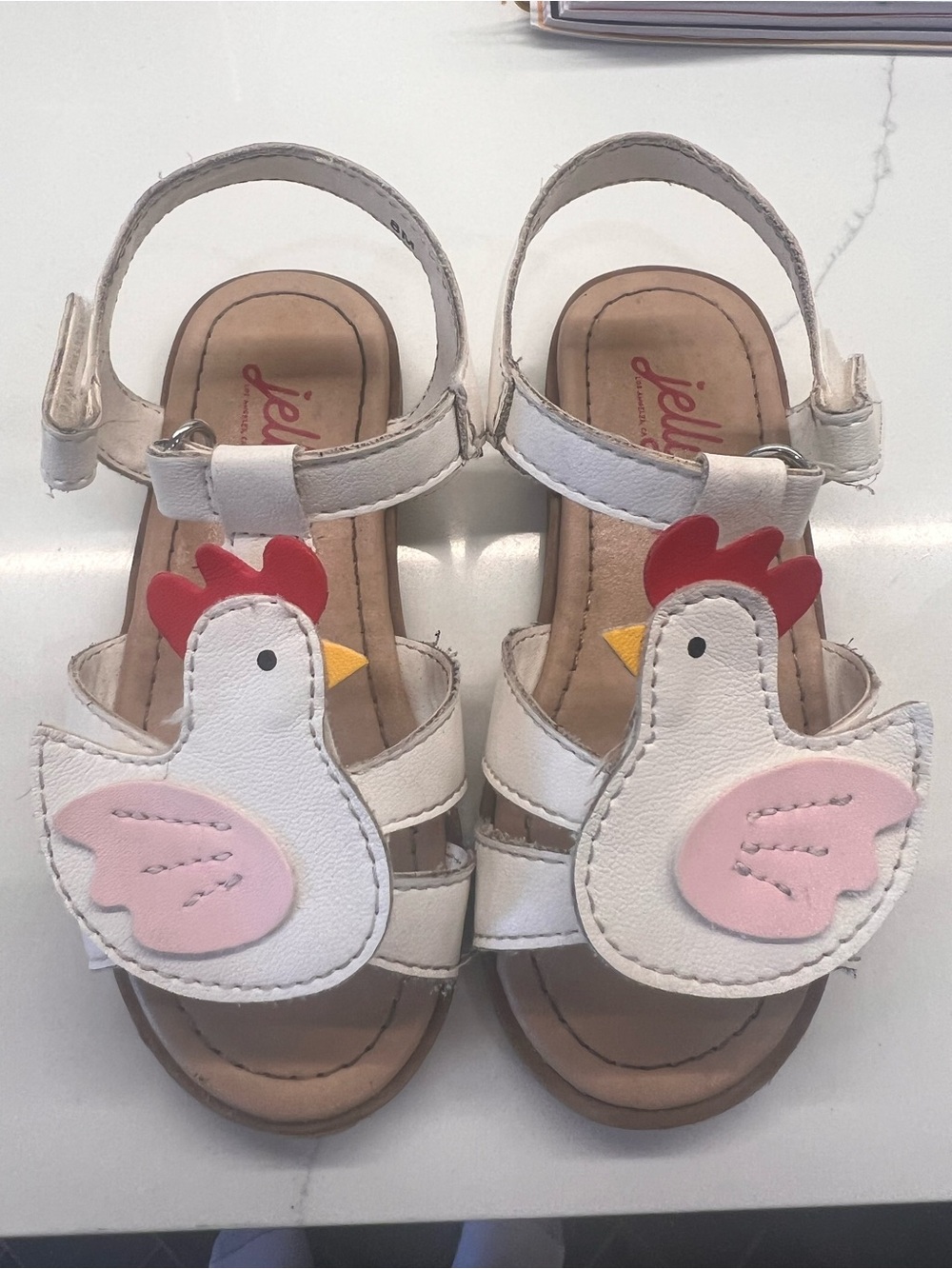 Jellypop White Chicken Sandals with Pink Wings
